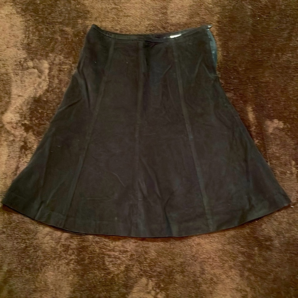 Black corduroy asymmetrical skirt. Size 10